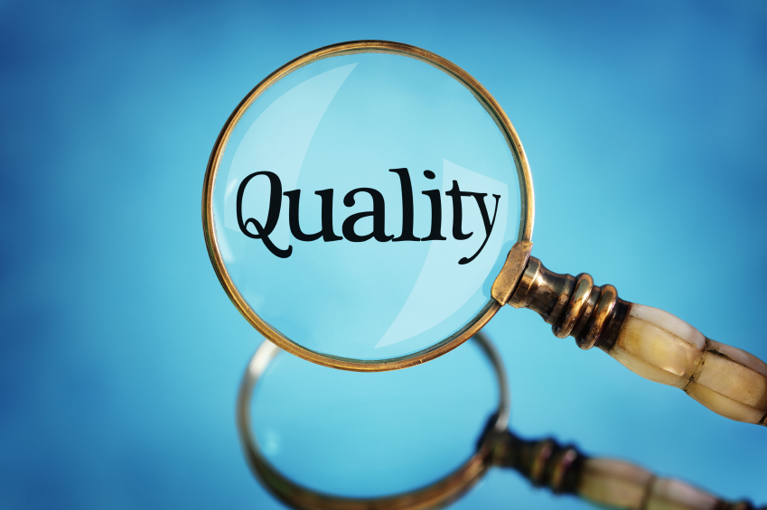 magnifying glass focus on word quality